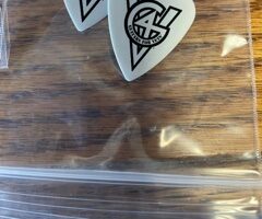 We are still selling custom made Guitar Pick Earrings featuring Guitars for Vets Logos for only $10. These are beautifully crafted and only $10 a pair. They’re so unique, you’ll love them!